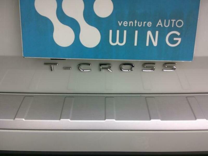 T CROSS