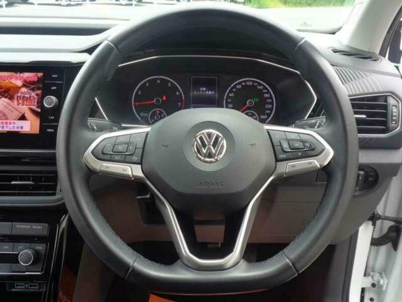 T CROSS