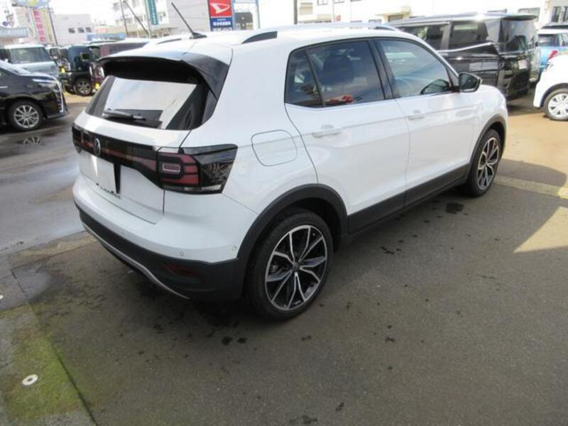 T CROSS