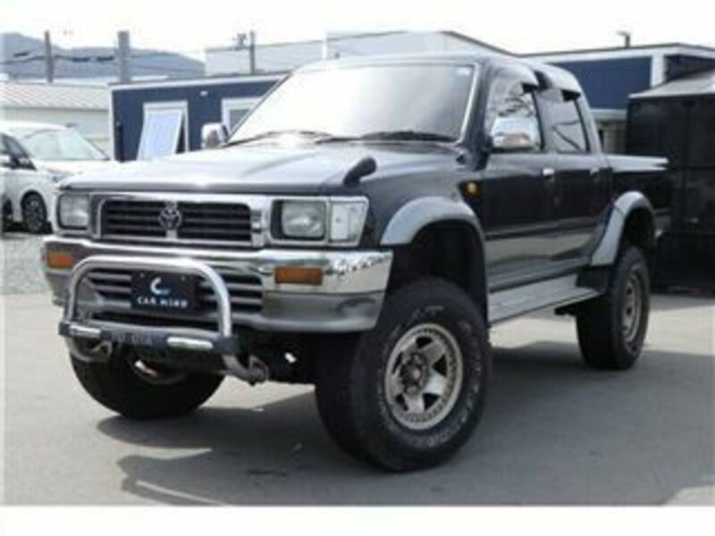 1999 maroon toyota hilux 4x4 pickup